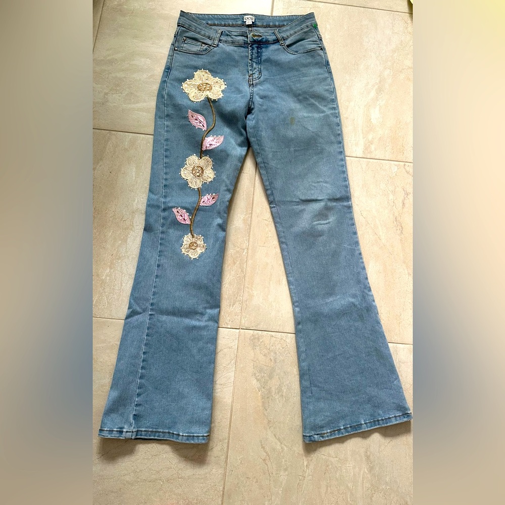 Embellished flared jeans.  Size 4